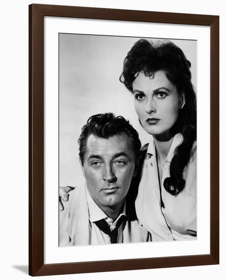 Bandido caballero by Richard Fleischer with Robert Mitchum and Ursula Thiess, 1956 (b/w photo)-null-Framed Photo