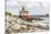 Bandon, Oregon, USA. Beach logs and the Coquille River Lighthouse on the Oregon coast.-Emily Wilson-Stretched Canvas