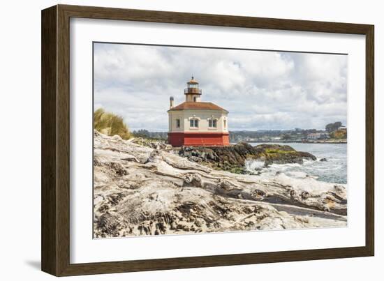 Bandon, Oregon, USA. Beach logs and the Coquille River Lighthouse on the Oregon coast.-Emily Wilson-Framed Photographic Print