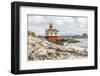 Bandon, Oregon, USA. Beach logs and the Coquille River Lighthouse on the Oregon coast.-Emily Wilson-Framed Photographic Print