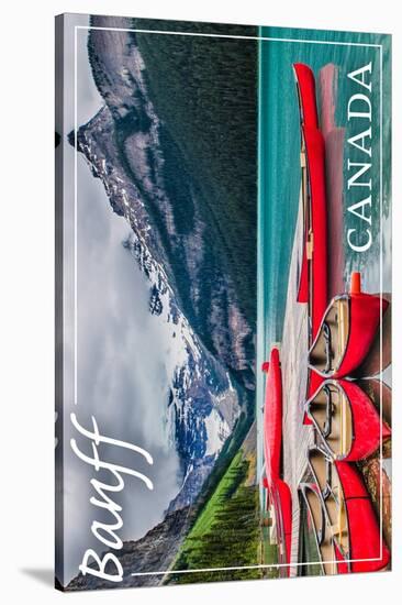 Banff, Canada - Lake Louise Canoes-Lantern Press-Stretched Canvas