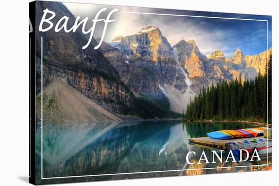 Banff, Canada - Moraine Lake Canoes-Lantern Press-Stretched Canvas