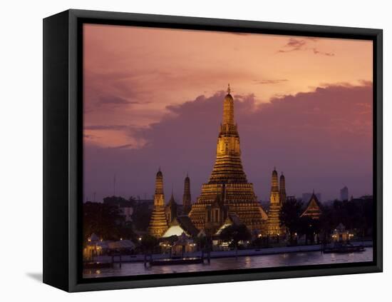 Bangkok, Thailand; the Wat Arun Temple across the Chao Phraya River at Sunset-Dan Bannister-Framed Stretched Canvas