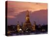 Bangkok, Thailand; the Wat Arun Temple across the Chao Phraya River at Sunset-Dan Bannister-Stretched Canvas