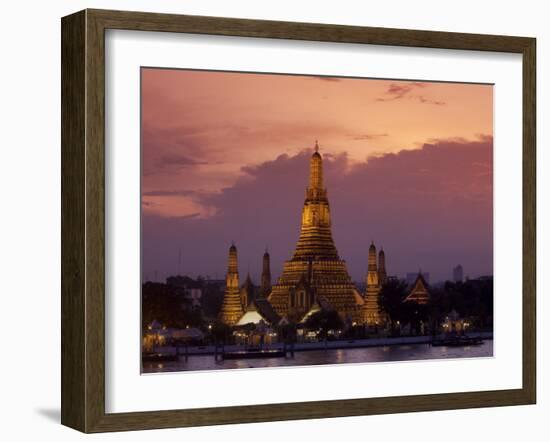 Bangkok, Thailand; the Wat Arun Temple across the Chao Phraya River at Sunset-Dan Bannister-Framed Photographic Print