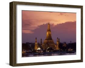 Bangkok, Thailand; the Wat Arun Temple across the Chao Phraya River at Sunset-Dan Bannister-Framed Photographic Print