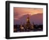 Bangkok, Thailand; the Wat Arun Temple across the Chao Phraya River at Sunset-Dan Bannister-Framed Photographic Print