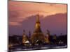 Bangkok, Thailand; the Wat Arun Temple across the Chao Phraya River at Sunset-Dan Bannister-Mounted Photographic Print