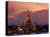 Bangkok, Thailand; the Wat Arun Temple across the Chao Phraya River at Sunset-Dan Bannister-Stretched Canvas