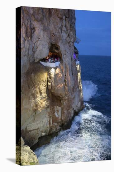 Bar Built in Cliff Caves, Cova D'En Xoroi in Evening, Cala En Porter-Stuart Black-Stretched Canvas