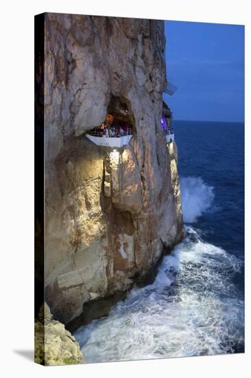 Bar Built in Cliff Caves, Cova D'En Xoroi in Evening, Cala En Porter-Stuart Black-Stretched Canvas