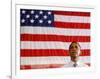 Barack Obama in front of US Flag, Flint, MI-null-Framed Photographic Print