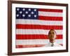 Barack Obama in front of US Flag, Flint, MI-null-Framed Photographic Print