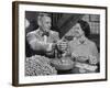 Barbara Angle Helping Her Husband Samuel Angle Prepare Food for the Flying Squirrels-Bernard Hoffman-Framed Photographic Print