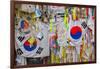 Barbed wire fence separates South from North Korea - South Korean flags and prayer wishes attach...-null-Framed Photographic Print