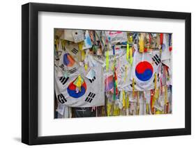 Barbed wire fence separates South from North Korea - South Korean flags and prayer wishes attach...-null-Framed Photographic Print