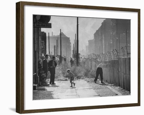 Barbed-Wire Tops Berlin Wall; West Berliners Gather Nearby-null-Framed Photographic Print