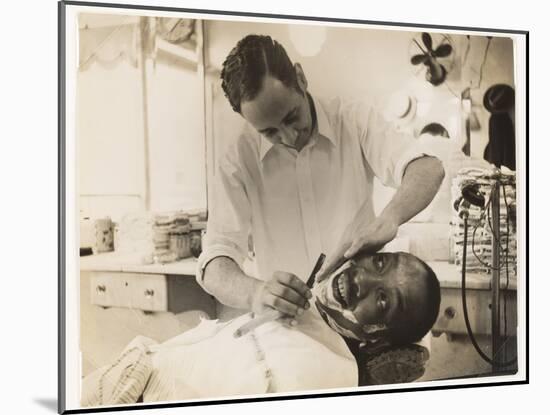 Barber giving a shave, c.1936-Lucien Aigner-Mounted Photographic Print