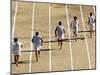 Barefoot Runners Wearing Tunics-null-Mounted Photographic Print