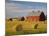 Barns and Hay Bales in Field-Darrell Gulin-Mounted Photographic Print
