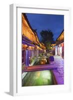 Bars and restaurants along canal at dusk, Lijiang, UNESCO World Heritage Site, Yunnan, China, Asia-Ian Trower-Framed Photographic Print