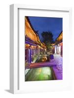 Bars and restaurants along canal at dusk, Lijiang, UNESCO World Heritage Site, Yunnan, China, Asia-Ian Trower-Framed Photographic Print