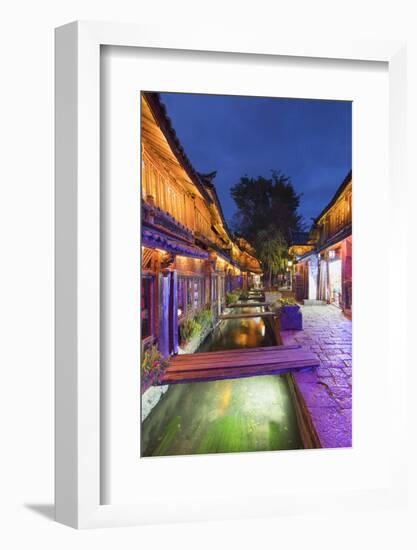 Bars and restaurants along canal at dusk, Lijiang, UNESCO World Heritage Site, Yunnan, China, Asia-Ian Trower-Framed Photographic Print