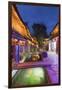 Bars and restaurants along canal at dusk, Lijiang, UNESCO World Heritage Site, Yunnan, China, Asia-Ian Trower-Framed Premium Photographic Print