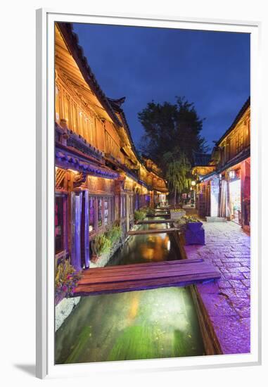 Bars and restaurants along canal at dusk, Lijiang, UNESCO World Heritage Site, Yunnan, China, Asia-Ian Trower-Framed Premium Photographic Print