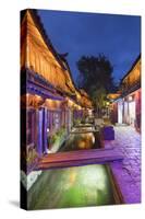 Bars and restaurants along canal at dusk, Lijiang, UNESCO World Heritage Site, Yunnan, China, Asia-Ian Trower-Stretched Canvas