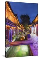 Bars and restaurants along canal at dusk, Lijiang, UNESCO World Heritage Site, Yunnan, China, Asia-Ian Trower-Stretched Canvas