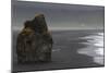 Basalt Column Rises from Black Sand Beach on Rainy Day, Vik, Iceland-Jaynes Gallery-Mounted Photographic Print