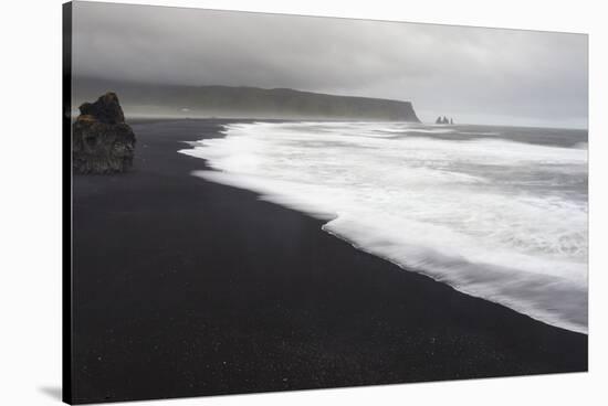 Basalt Column Rises from Black Sand Beach on Rainy Day, Vik, Iceland-Jaynes Gallery-Stretched Canvas