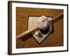 Baseball Bat with a Cap, and a Baseball on the Home Base-null-Framed Photographic Print