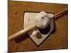 Baseball Bat with a Cap, and a Baseball on the Home Base-null-Mounted Photographic Print