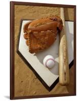 Baseball Bat with a Glove, and a Baseball on the Home Base-null-Framed Photographic Print
