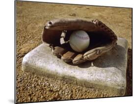 Baseball in a Baseball Glove on a Base-null-Mounted Photographic Print