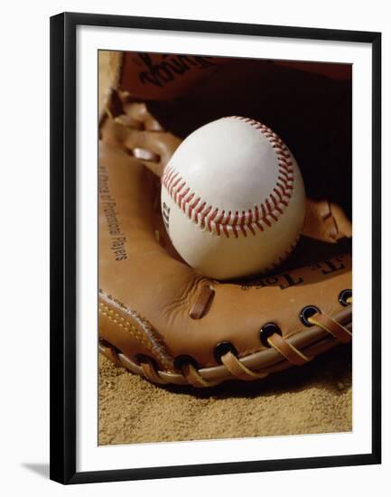 Baseball in a Glove-null-Framed Premium Photographic Print