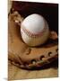 Baseball in a Glove-null-Mounted Photographic Print