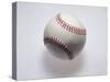 Baseball on a White Background-null-Stretched Canvas