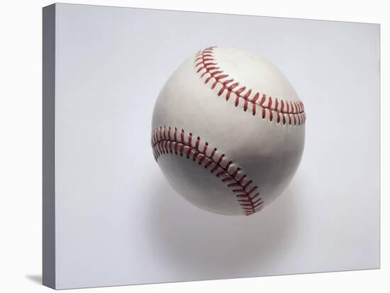 Baseball on a White Background-null-Stretched Canvas