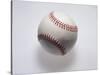 Baseball on a White Background-null-Stretched Canvas