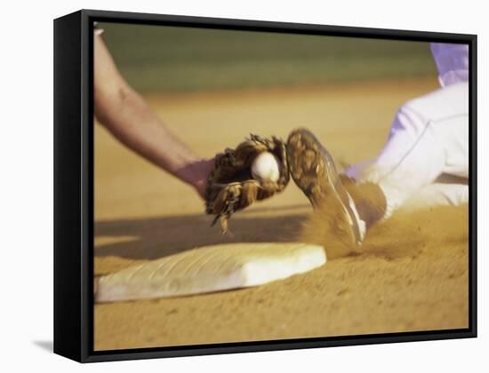 Baseball Player Sliding at a Base, and a Gloved Hand Holding a Ball-null-Framed Stretched Canvas