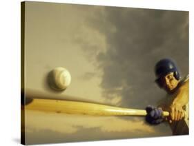 Baseball Player Swinging a Bat-null-Stretched Canvas