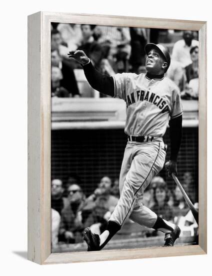Baseball Player Willie Mays Watching Ball Clear Fence for Home Run in Game with Dodgers-Ralph Morse-Framed Stretched Canvas