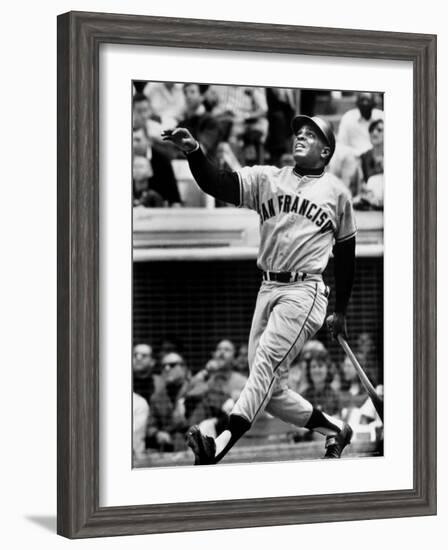 Baseball Player Willie Mays Watching Ball Clear Fence for Home Run in Game with Dodgers-Ralph Morse-Framed Premium Photographic Print