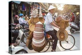 Basket and Hat Seller on Bicycle, Hanoi, Vietnam-Peter Adams-Stretched Canvas