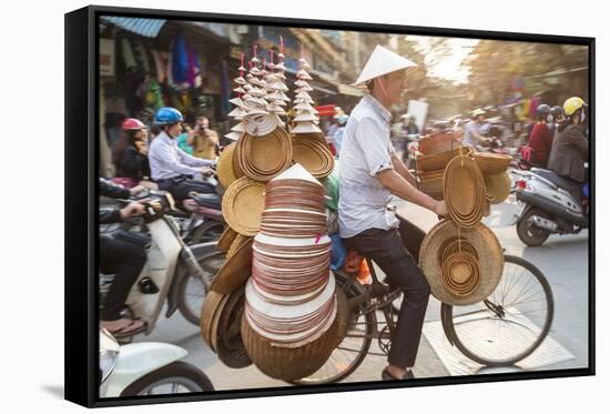 Basket and Hat Seller on Bicycle, Hanoi, Vietnam-Peter Adams-Framed Stretched Canvas