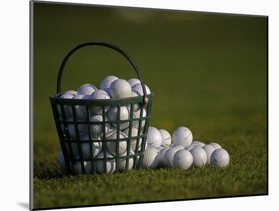 Basket of Golf Balls-null-Mounted Photographic Print