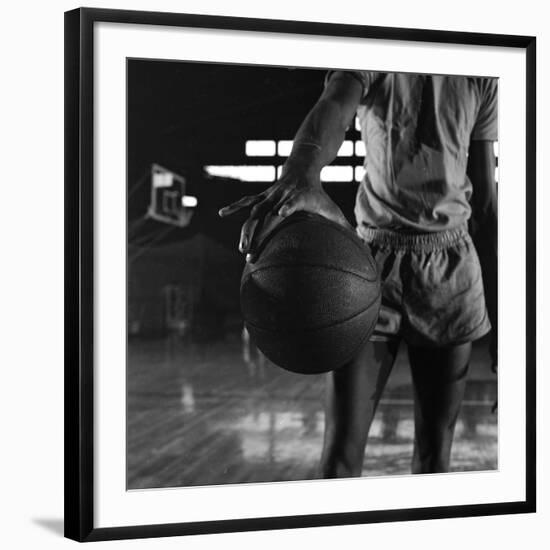 Basketball Held by Player Wilt Chamberlain, 1956-Frank Scherschel-Framed Photographic Print